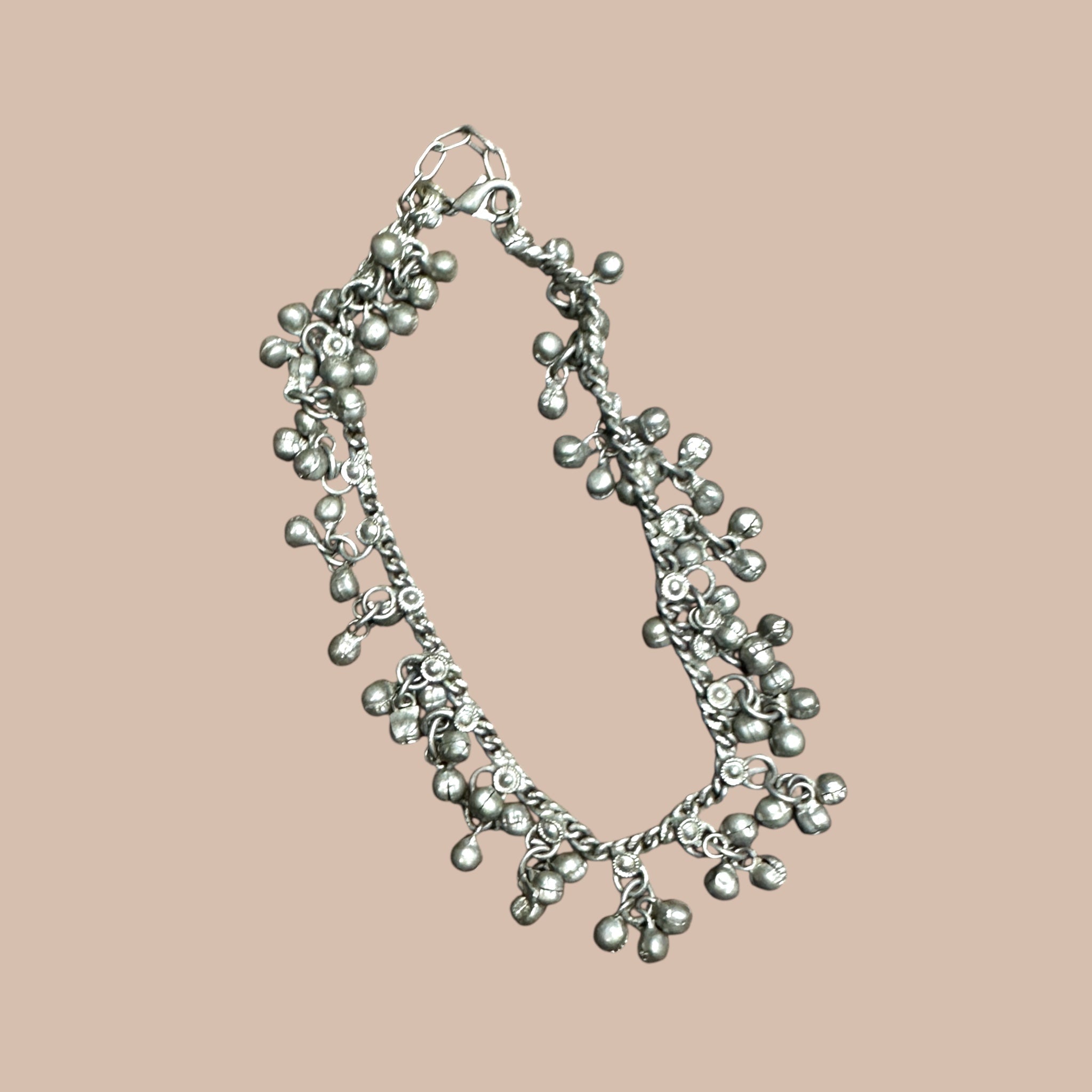 Nilkkakoru kulkusilla Bloomy Moon