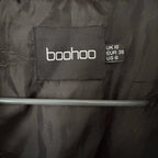 Boohoo musta karvaliivi 38 Bloomy Moon